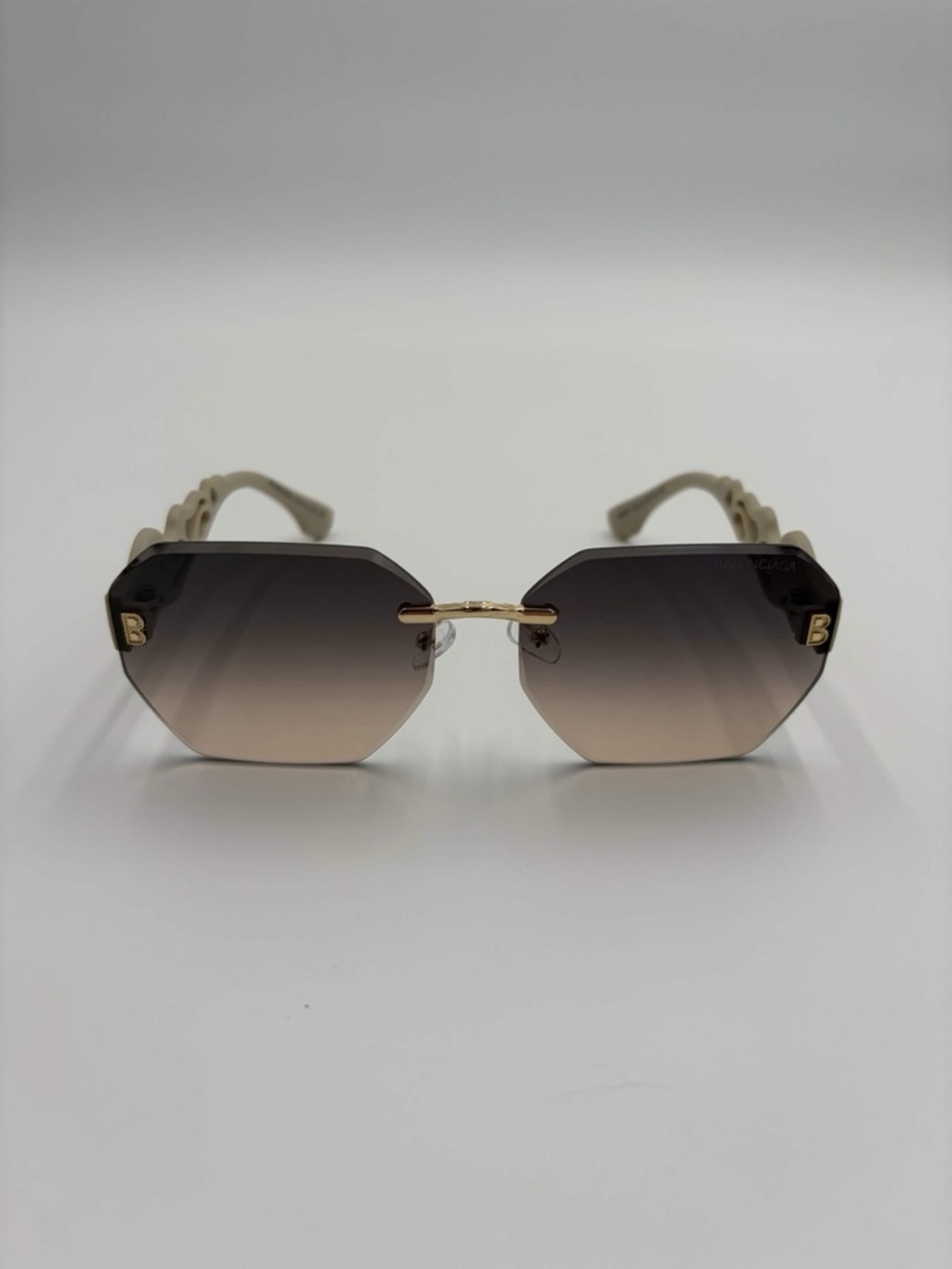 Balenciaga Flame Rimless Sunglasses with Beige and Gold frame